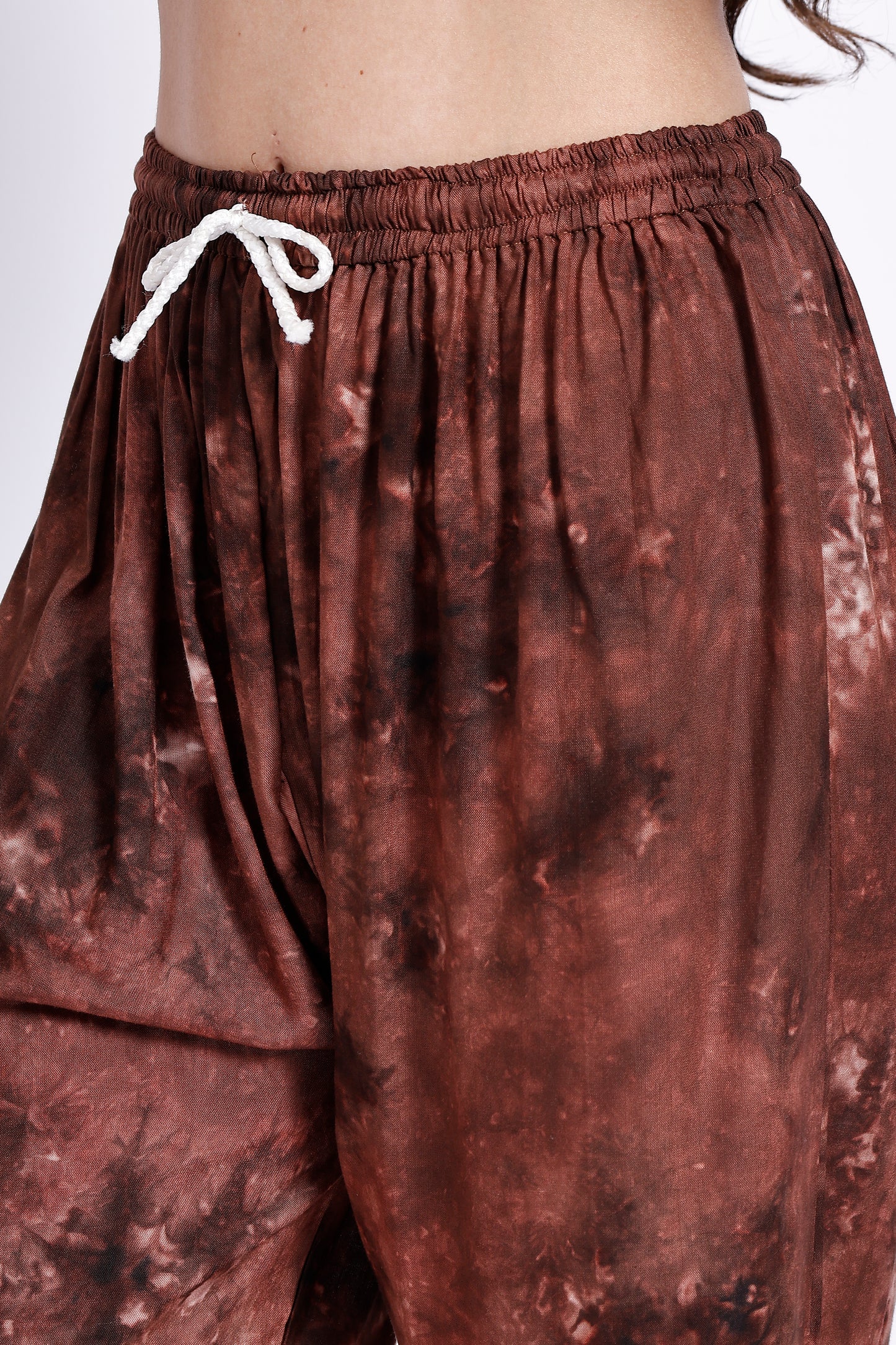The Chikankari Story Embroidered Rayon Tie-Dyed Chikankari Brown Kurti plazzo set having bollywood 3D Embroidery.