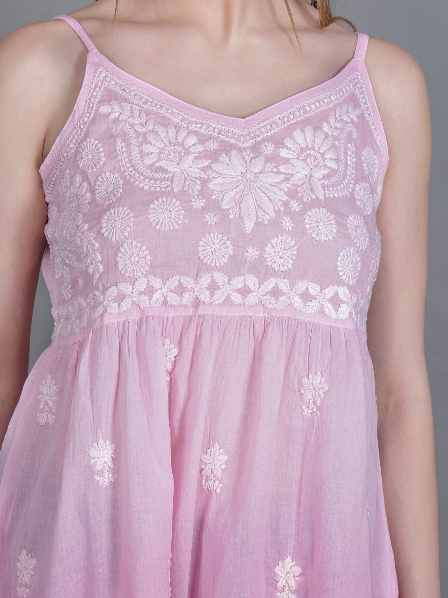The Chikankari Story Handcrafted Sleeveless Chikankari Mul Cotton Top with Intricate White Floral Embroidery in Ombre Shades – Light Blue, Sea Green, Light Peach, Light Purple, Light Pink & Light Yellow.