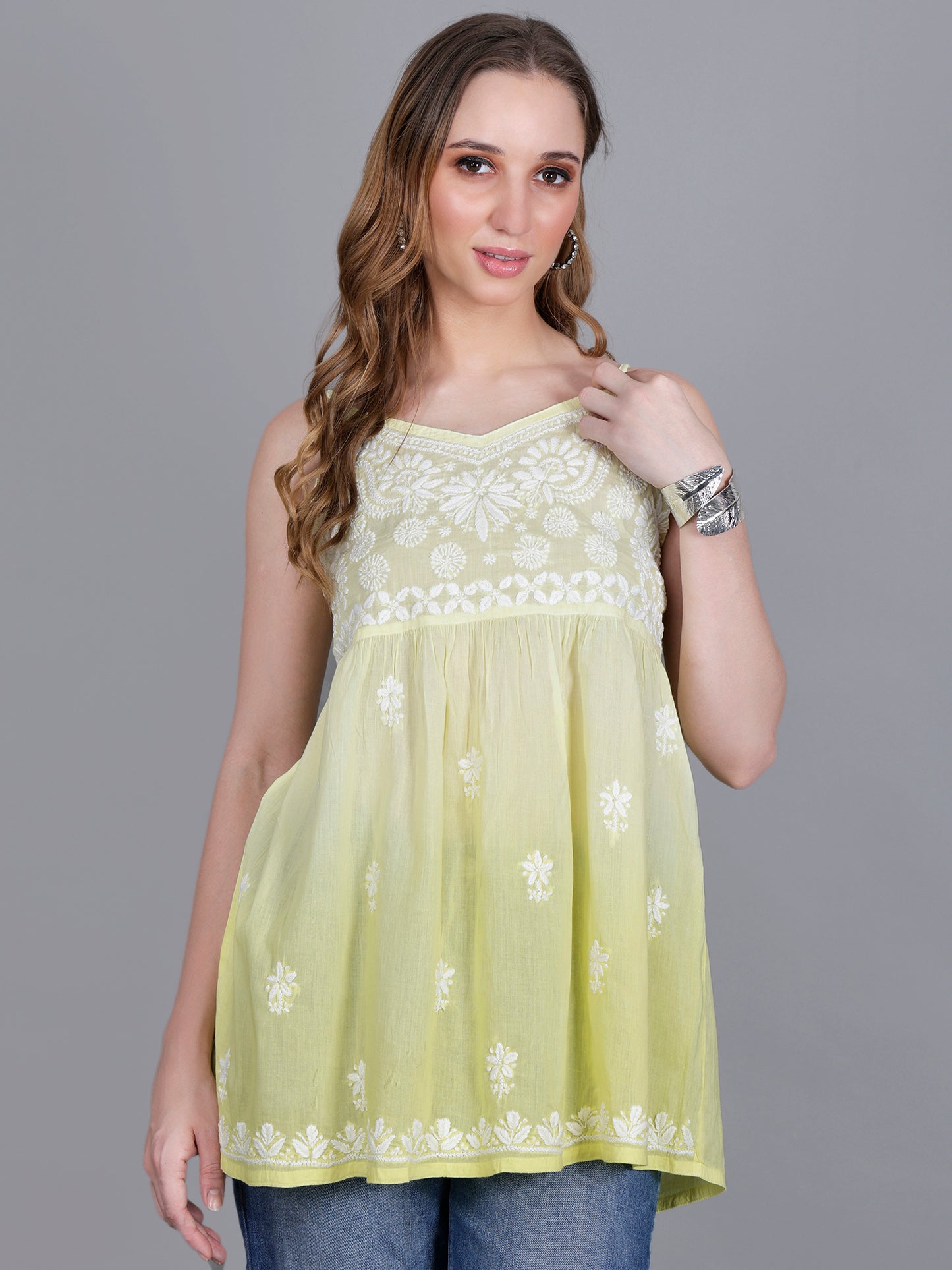 The Chikankari Story Handcrafted Sleeveless Chikankari Mul Cotton Top with Intricate White Floral Embroidery in Ombre Shades – Light Blue, Sea Green, Light Peach, Light Purple, Light Pink & Light Yellow.
