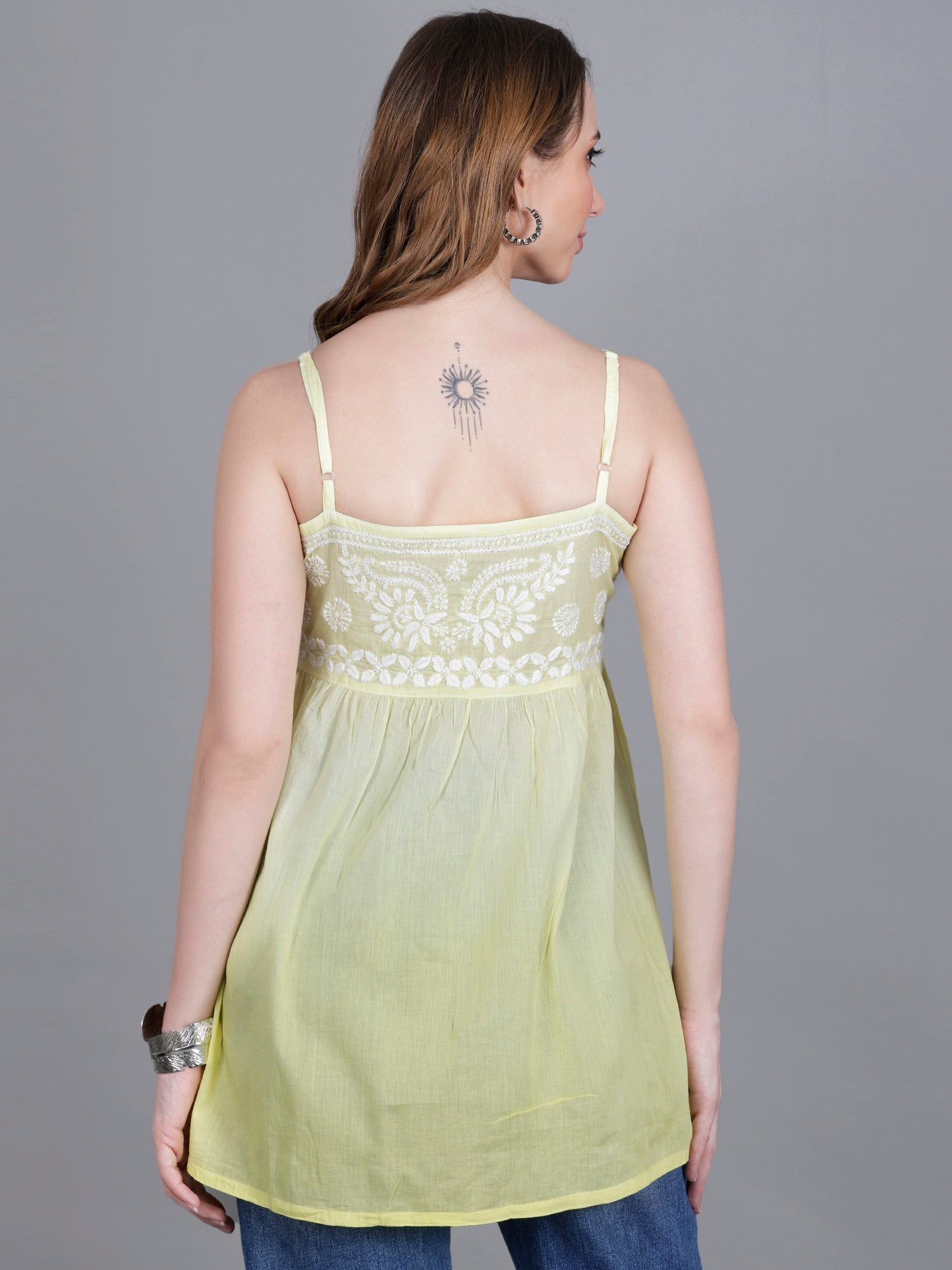 The Chikankari Story Handcrafted Sleeveless Chikankari Mul Cotton Top with Intricate White Floral Embroidery in Ombre Shades – Light Blue, Sea Green, Light Peach, Light Purple, Light Pink & Light Yellow.