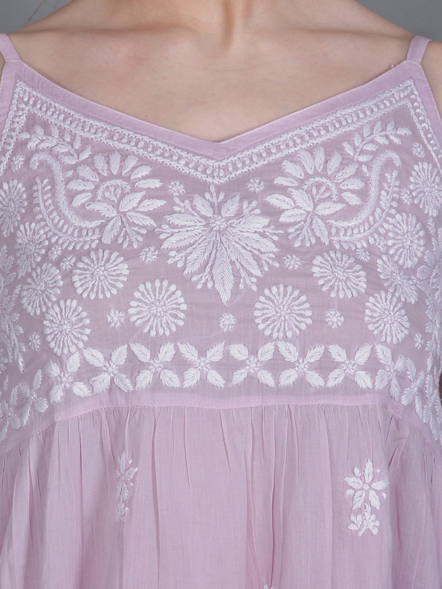 The Chikankari Story Handcrafted Sleeveless Chikankari Mul Cotton Top with Intricate White Floral Embroidery in Ombre Shades – Light Blue, Sea Green, Light Peach, Light Purple, Light Pink & Light Yellow.
