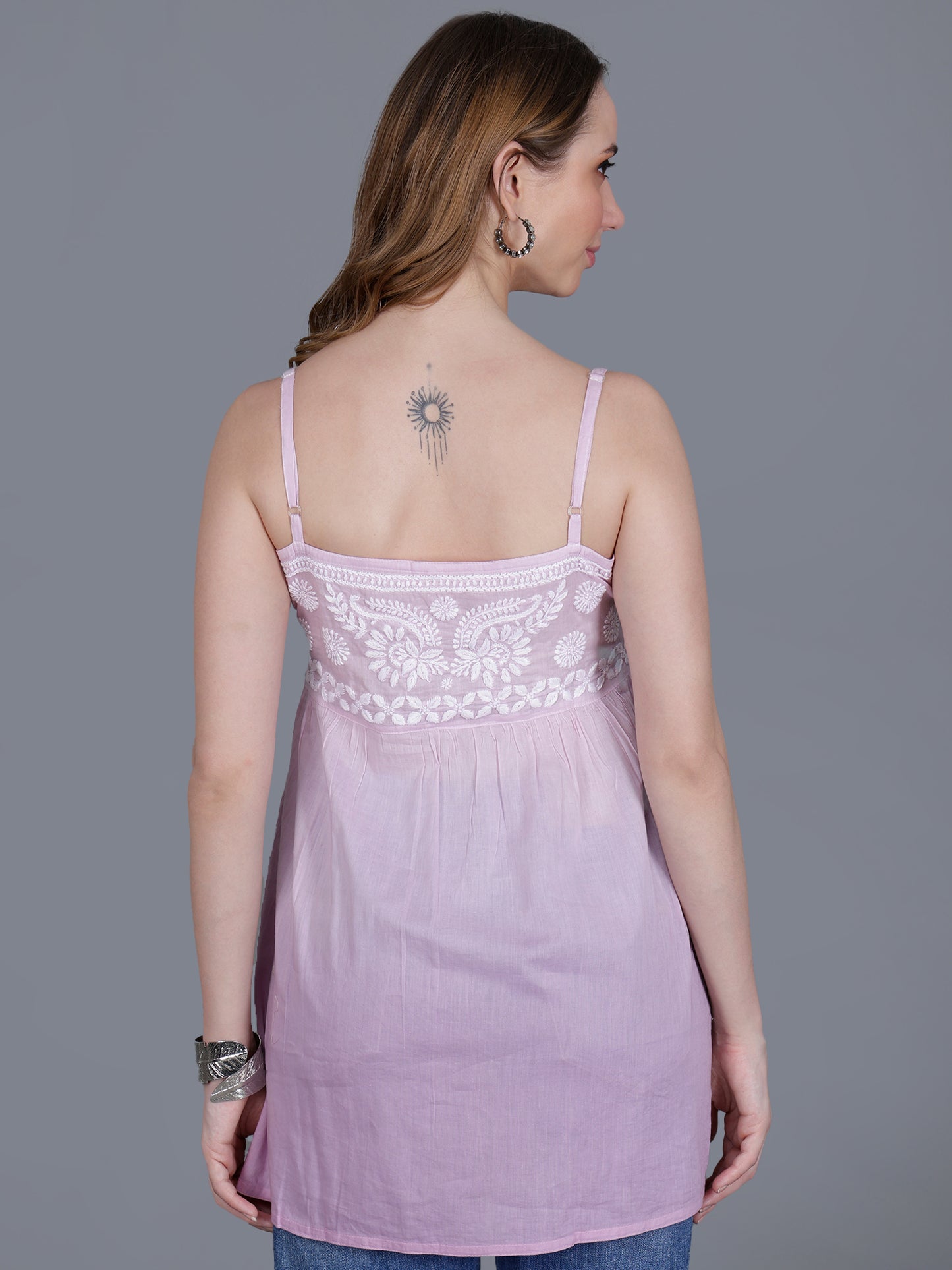 The Chikankari Story Handcrafted Sleeveless Chikankari Mul Cotton Top with Intricate White Floral Embroidery in Ombre Shades – Light Blue, Sea Green, Light Peach, Light Purple, Light Pink & Light Yellow.