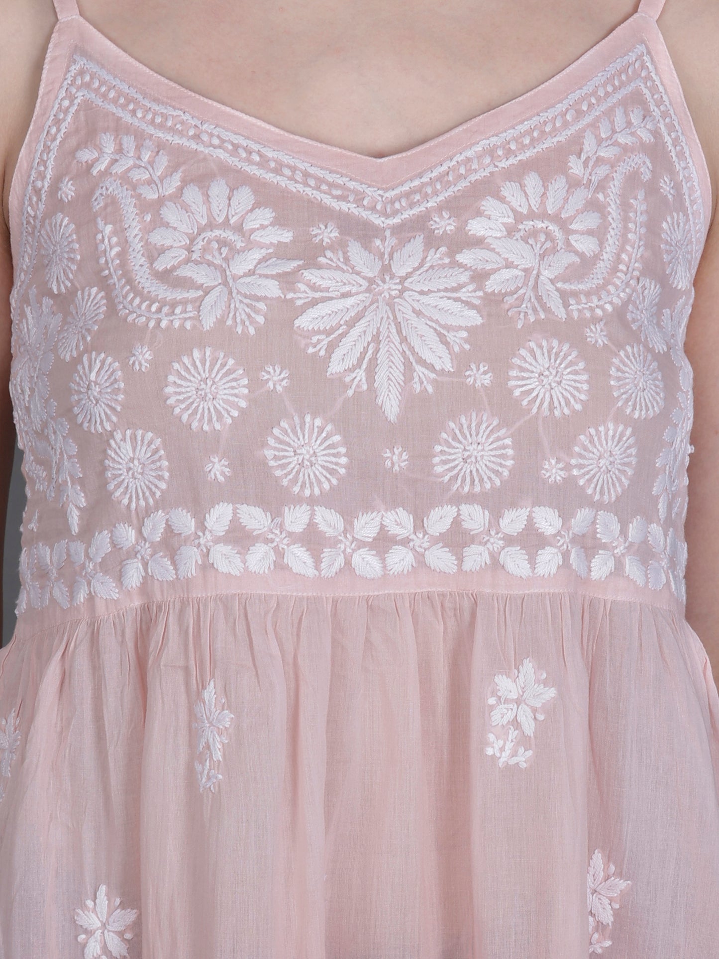 The Chikankari Story Handcrafted Sleeveless Chikankari Mul Cotton Top with Intricate White Floral Embroidery in Ombre Shades – Light Blue, Sea Green, Light Peach, Light Purple, Light Pink & Light Yellow.