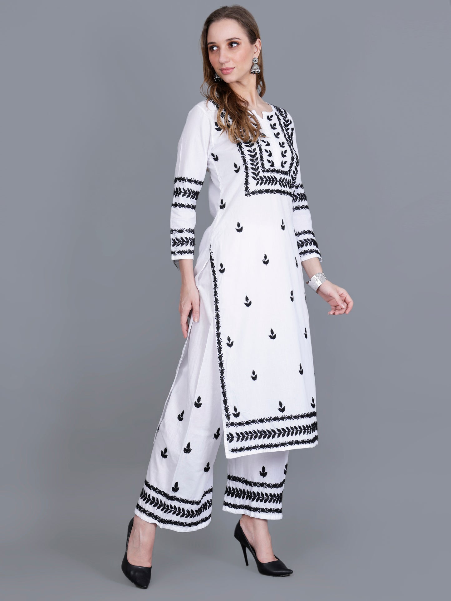 The Chikankari Story Women’s White Hand-Embroidered Kurta Set with Black Lucknowi Work – Straight Fit Kurta & Palazzo.