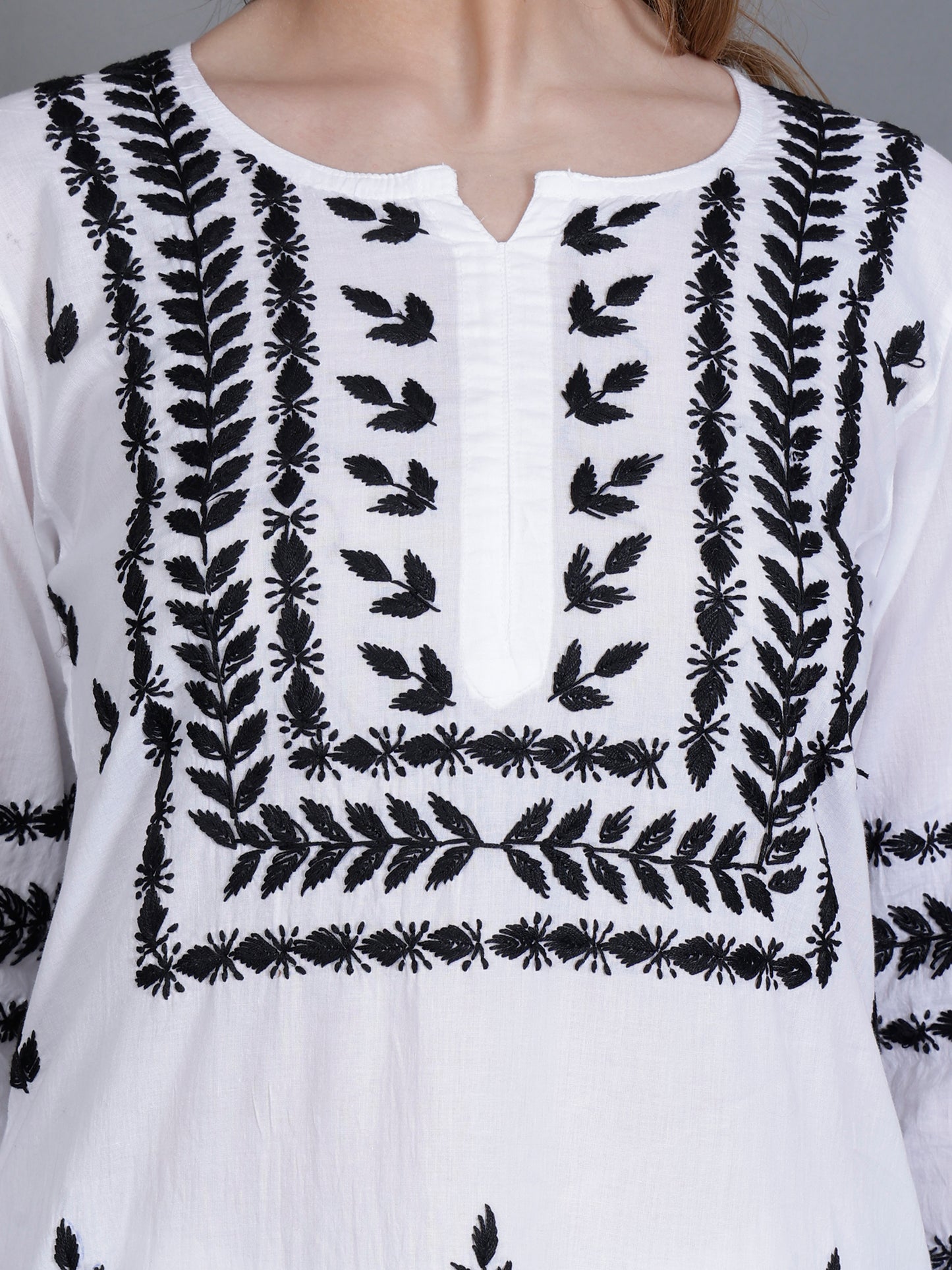 The Chikankari Story Women’s White Hand-Embroidered Kurta Set with Black Lucknowi Work – Straight Fit Kurta & Palazzo.