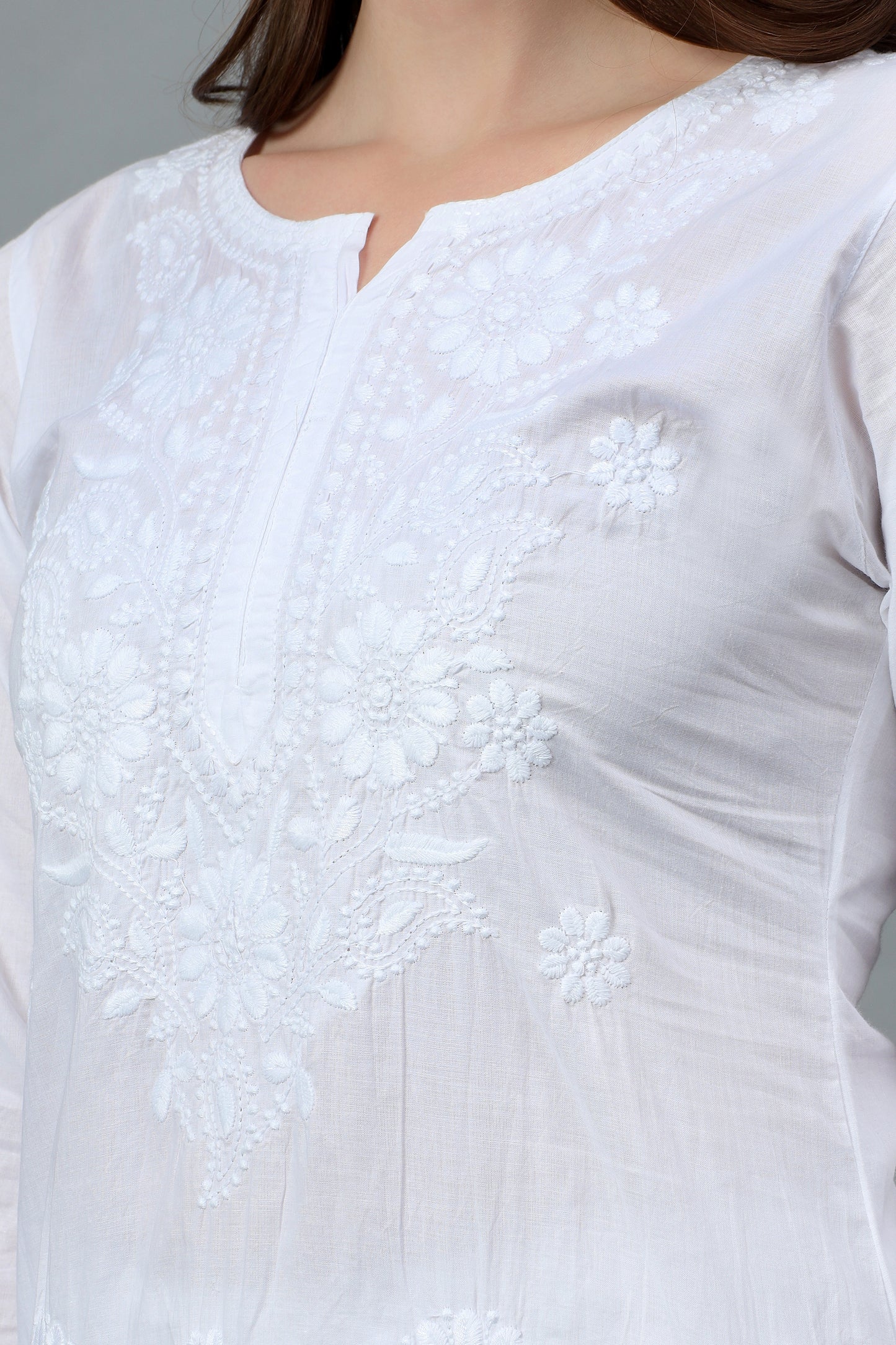 The Chikankari Story Pure Cotton Kurti for Women - Fine Chikan Kari Machine Embroidery in Ombre Shades of Purple, White, Yellow, Pink, and Blue.