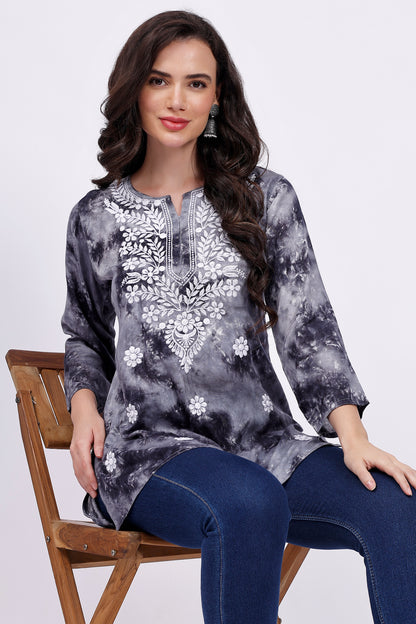 The Chikankari Story Embroidered Rayon Tie-Dyed Chikankari Grey short Kurti with 3D Embroidery.