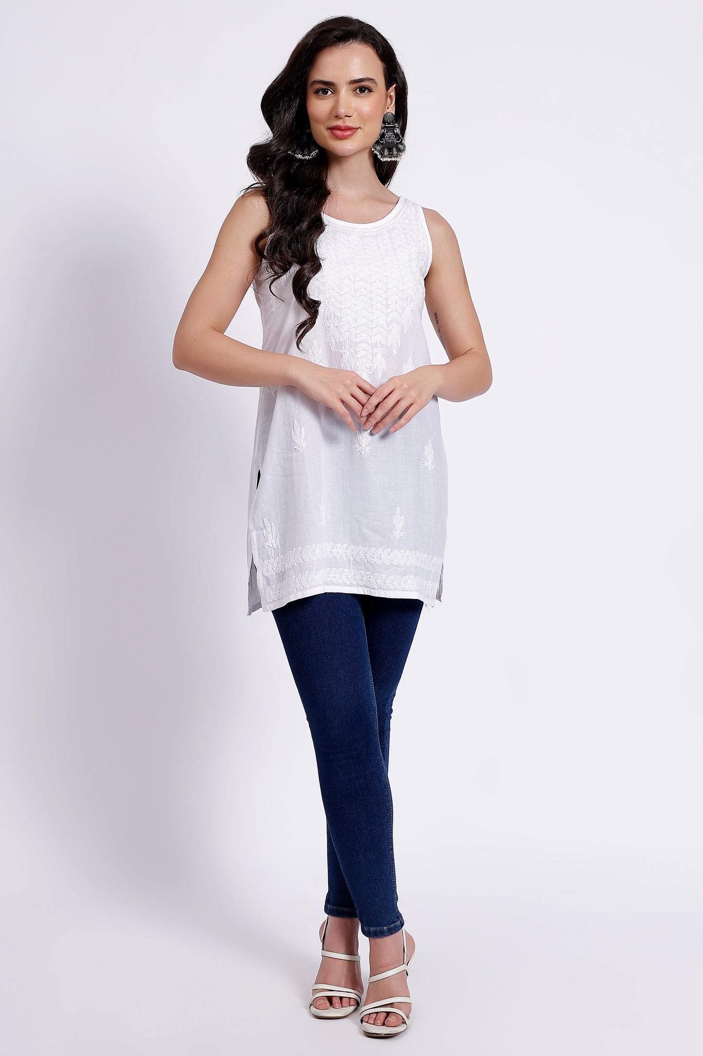 The Chikankari Story White Sleeveless Chikankari Top and Tunic with Hand Embroidery – Lakhnavi Bakhiya and Thread Work.