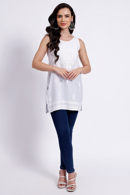 The Chikankari Story White Sleeveless Chikankari Top and Tunic with Hand Embroidery – Lakhnavi Bakhiya and Thread Work.