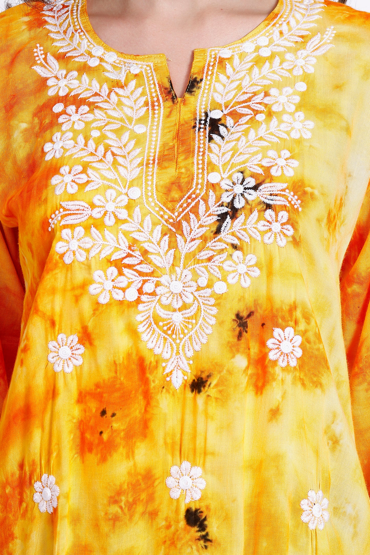 The Chikankari Story Embroidered Rayon Tie-Dyed Chikankari Yellow short Kurti with 3D Embroidery.