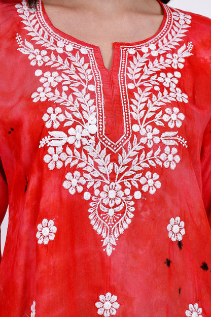 The Chikankari Story Embroidered Rayon Tie-Dyed Chikankari Red short Kurti with 3D Embroidery.