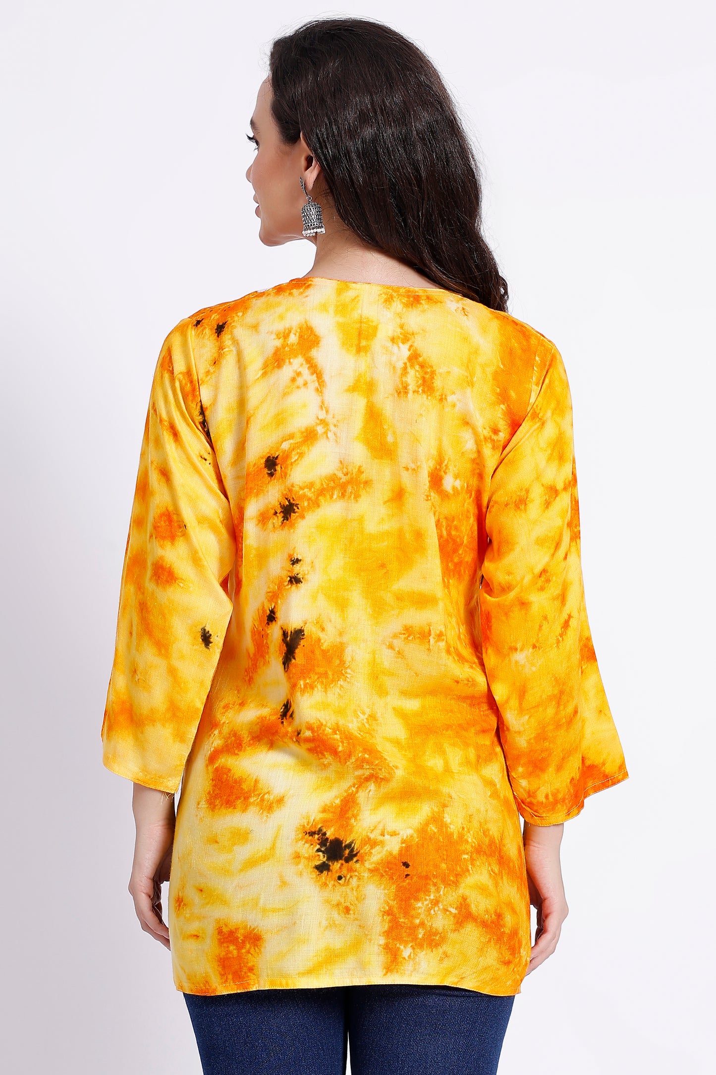 The Chikankari Story Embroidered Rayon Tie-Dyed Chikankari Yellow short Kurti with 3D Embroidery.