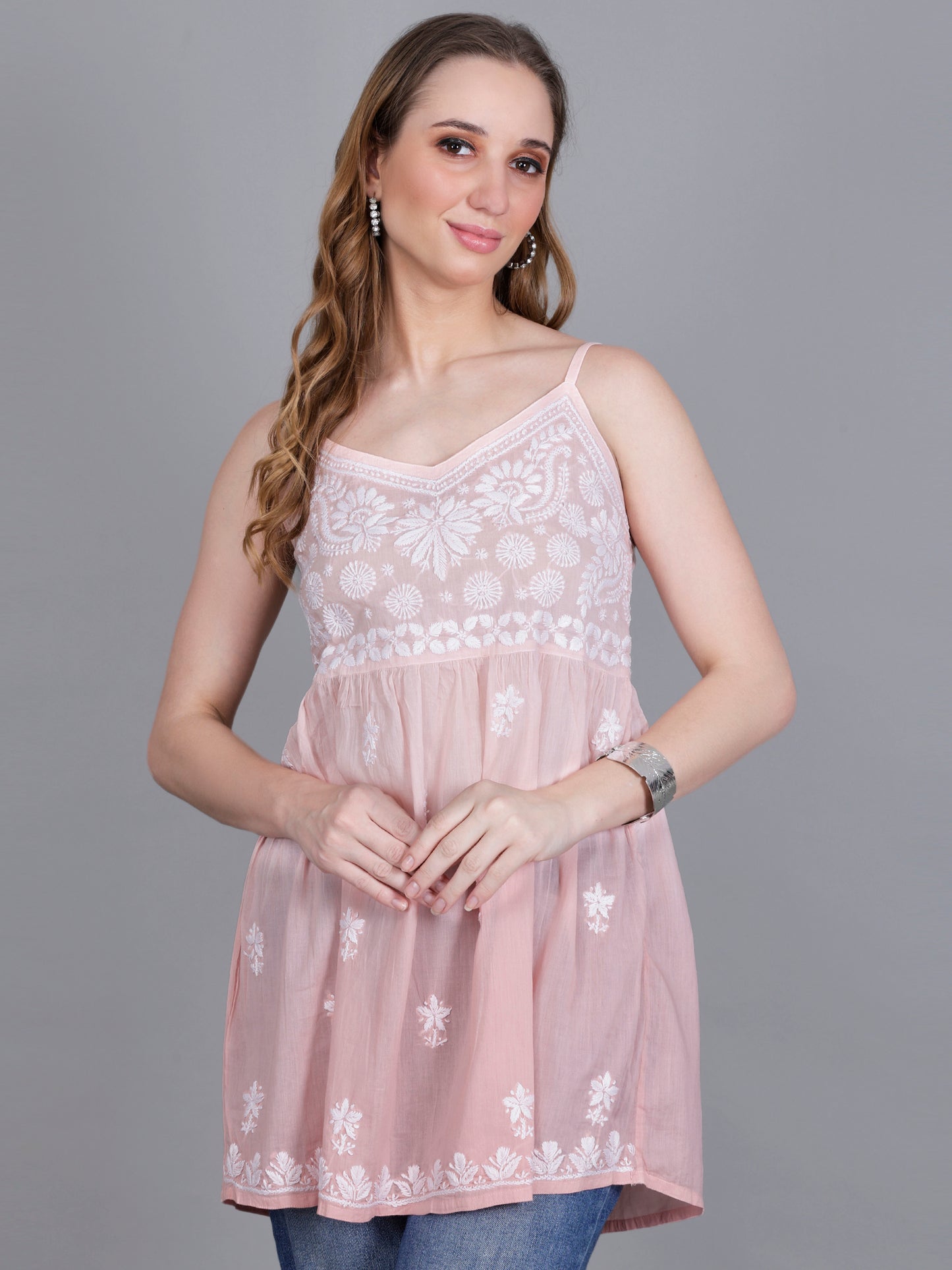 The Chikankari Story Handcrafted Sleeveless Chikankari Mul Cotton Top with Intricate White Floral Embroidery in Ombre Shades – Light Blue, Sea Green, Light Peach, Light Purple, Light Pink & Light Yellow.