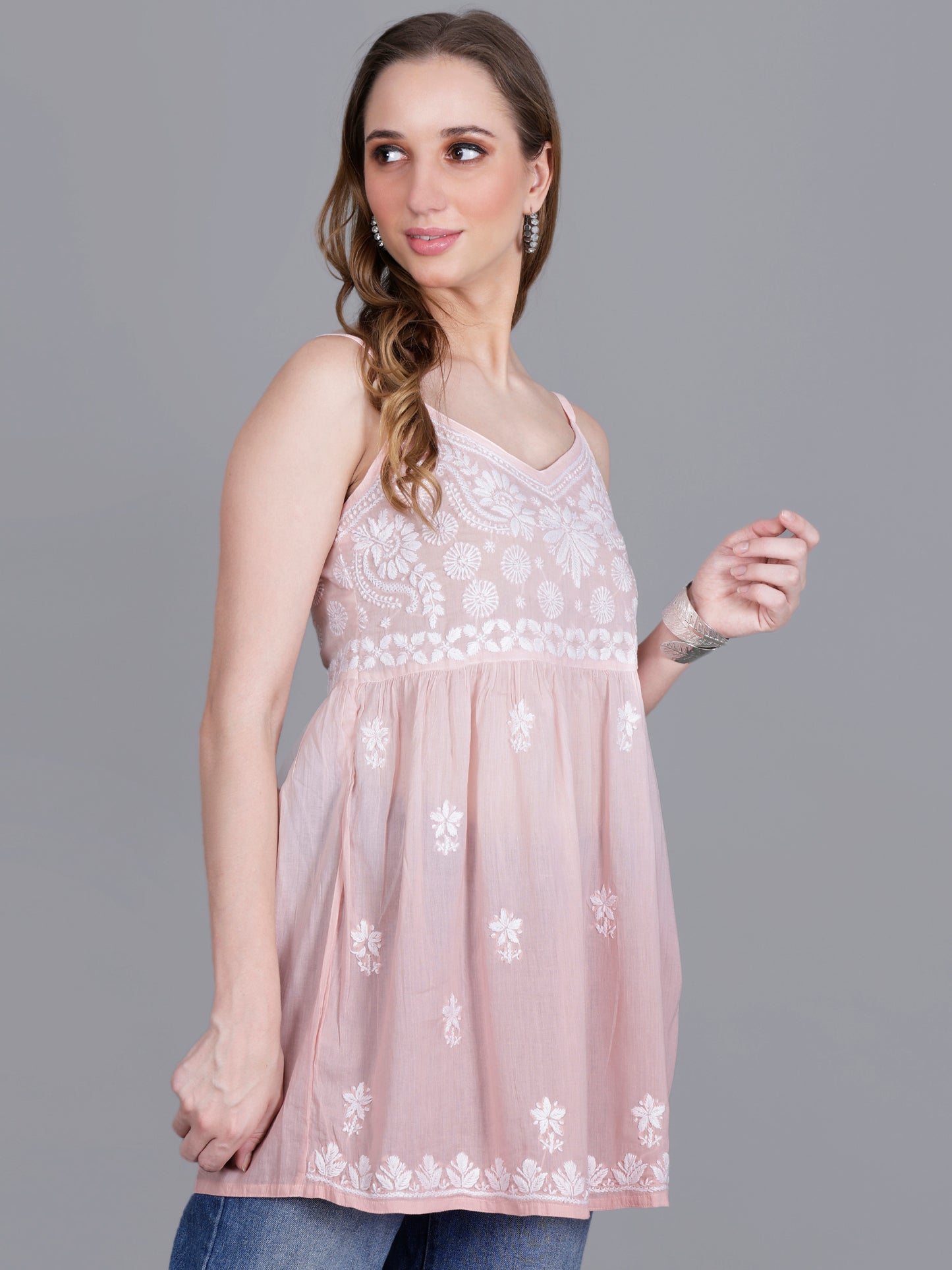 The Chikankari Story Handcrafted Sleeveless Chikankari Mul Cotton Top with Intricate White Floral Embroidery in Ombre Shades – Light Blue, Sea Green, Light Peach, Light Purple, Light Pink & Light Yellow.