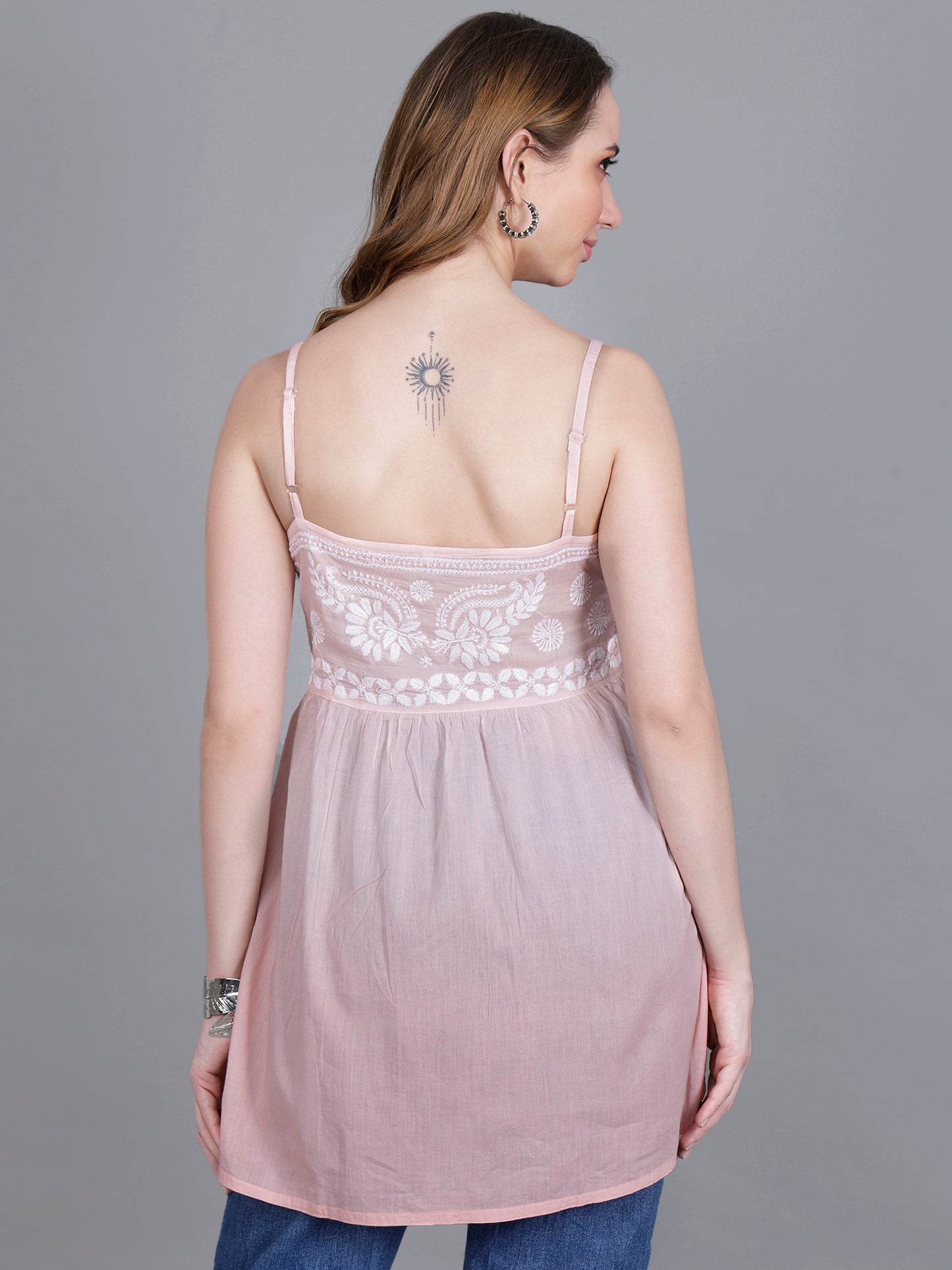 The Chikankari Story Handcrafted Sleeveless Chikankari Mul Cotton Top with Intricate White Floral Embroidery in Ombre Shades – Light Blue, Sea Green, Light Peach, Light Purple, Light Pink & Light Yellow.