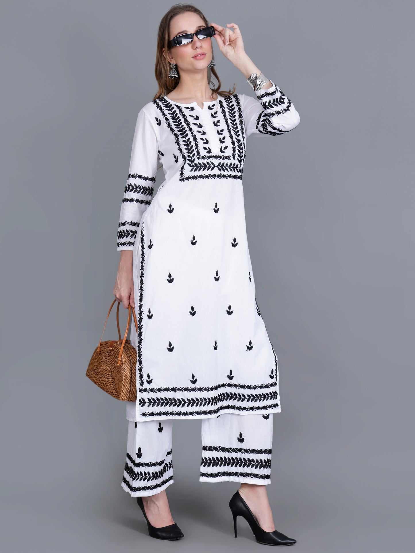 The Chikankari Story Women’s White Hand-Embroidered Kurta Set with Black Lucknowi Work – Straight Fit Kurta & Palazzo.