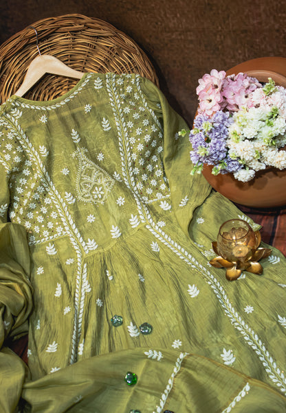 The Chikankari Story Frock and Dupatta Set – Hand Embroidery on Pure Mul Chanderi Fabric with Thread Work, Mukaish Detailing, and Lakhnavi Motifs.