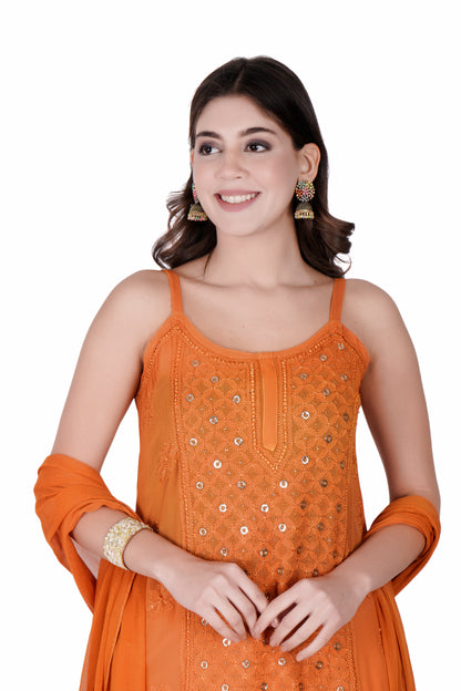 The Chikankari Story Orange Viscose Chikankari Kurta Set with Bakhya Work & Ring Mukaish Dupatta - Lucknowi Kurta and Pant Ensemble